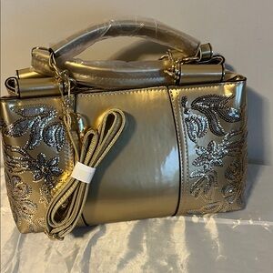 Elegant Gold Handbag with Silver Accents